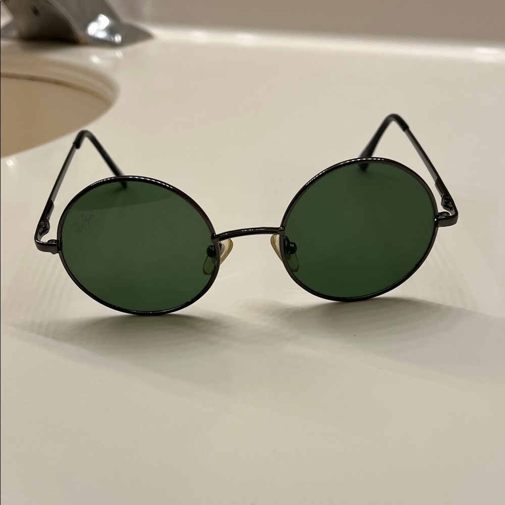 Round Black Sunglasses with Green Lenses